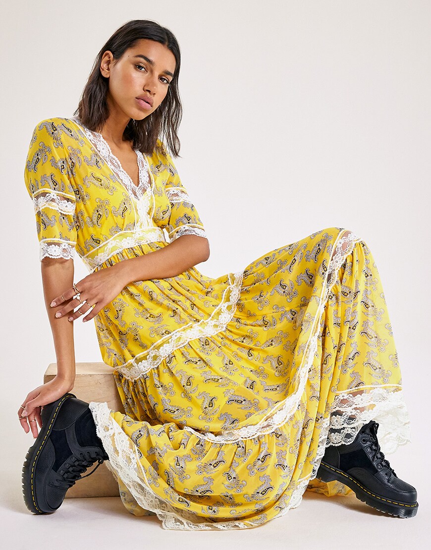 A model wearing a yellow dress | ASOS Style Feed