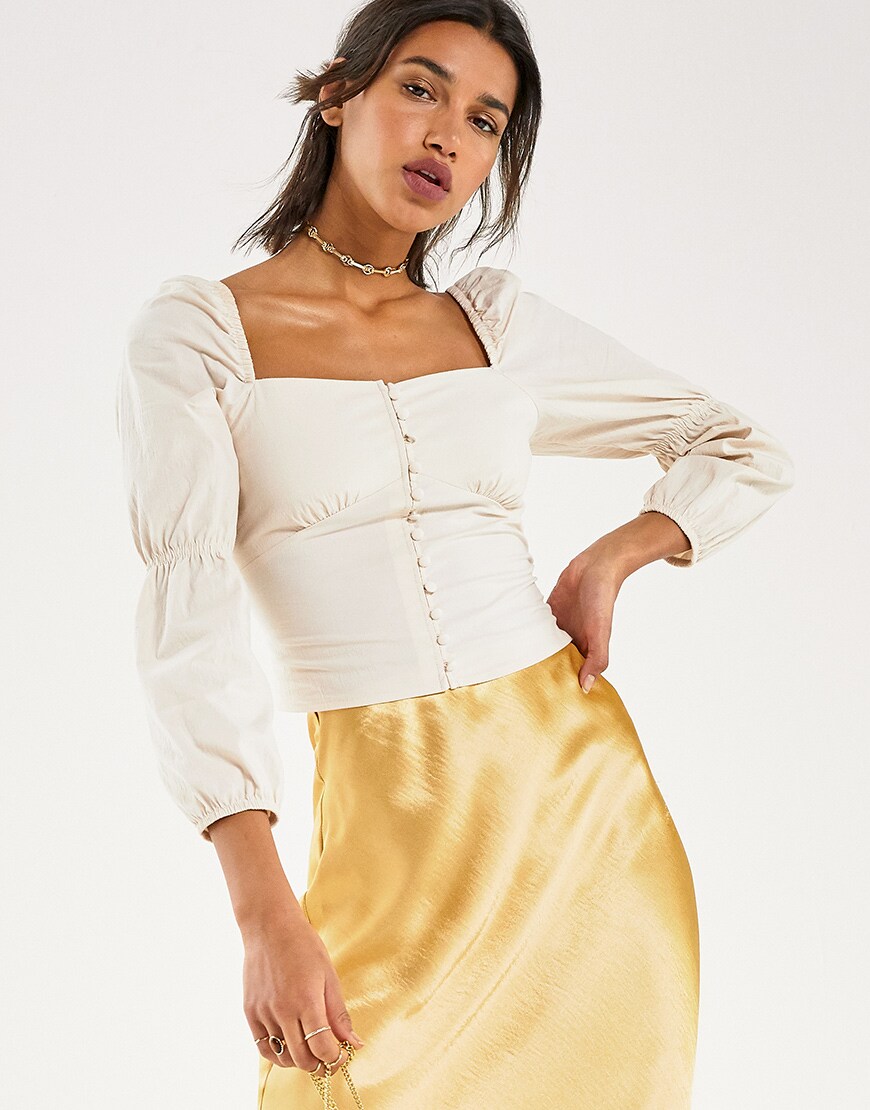A model wearing a yellow skirt and peasant blouse | ASOS Style Feed