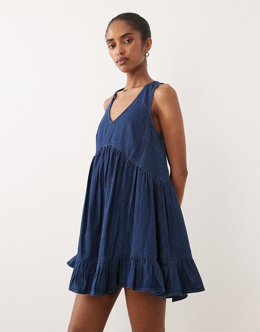 Model wearing denim mini dress | ASOS Style Feed