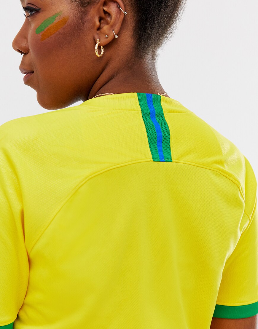 A picture of an ASOSer wearing the Brazil Nike football top. Available at ASOS.