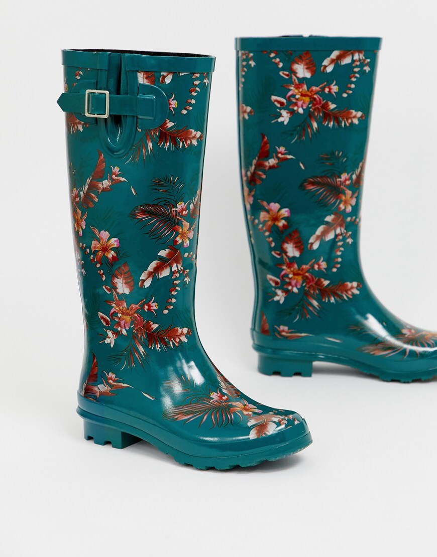 A picture of a pair of floral print wellington boots. Available at ASOS.