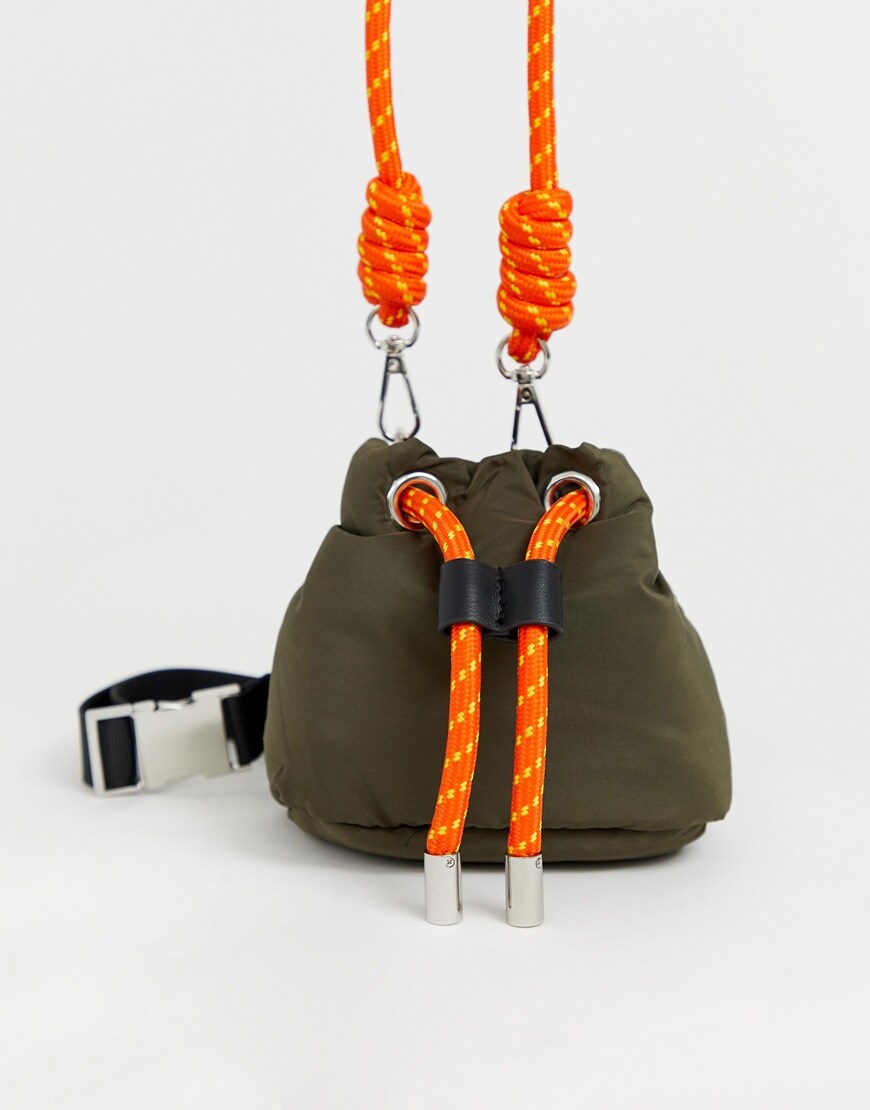 A picture of a green bucket bag with rope-style straps from Pull & Bear, available at ASOS.