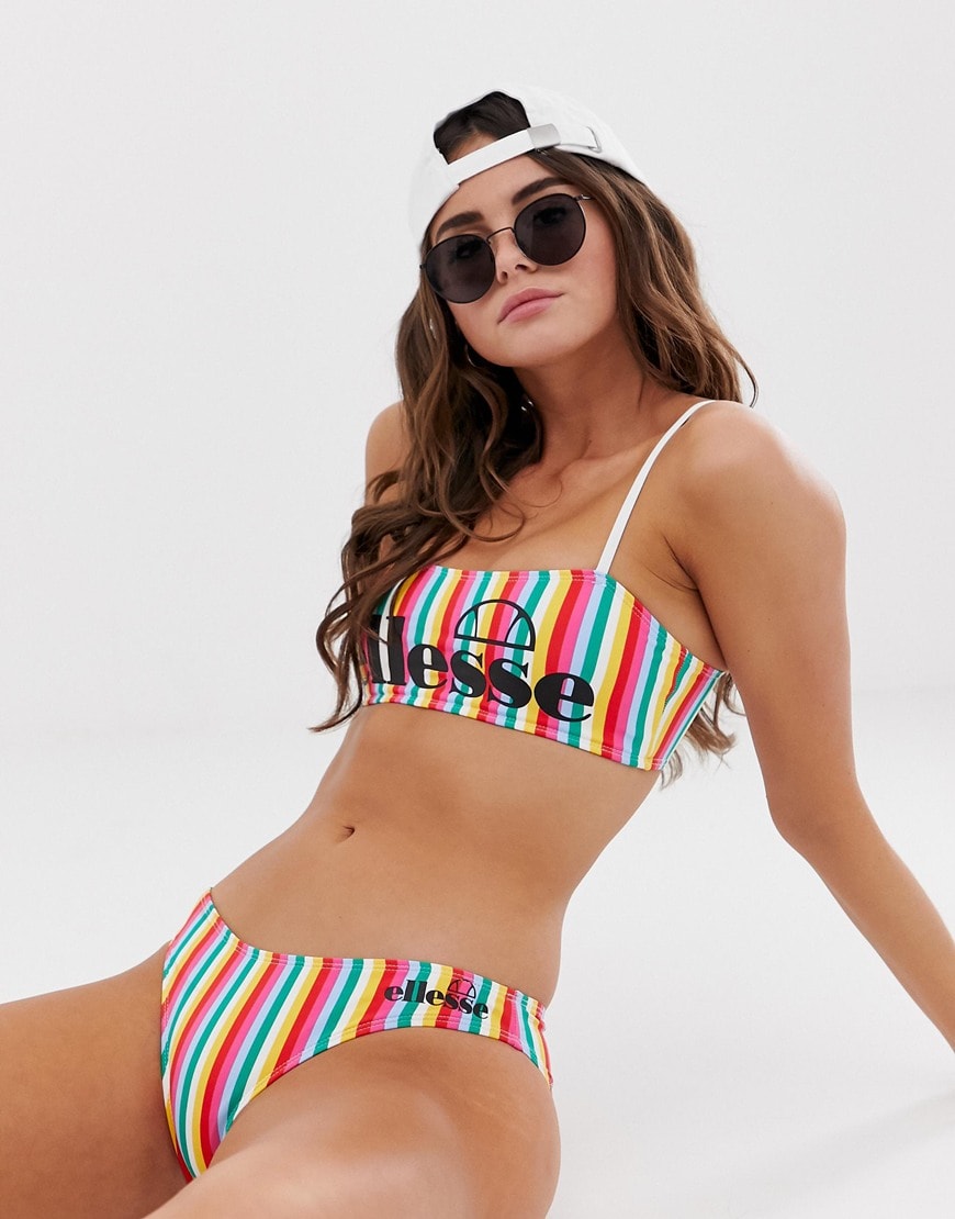 Ellesse – Bikiniunterteil mit Hüftschnitt in Regenbogen gestreift