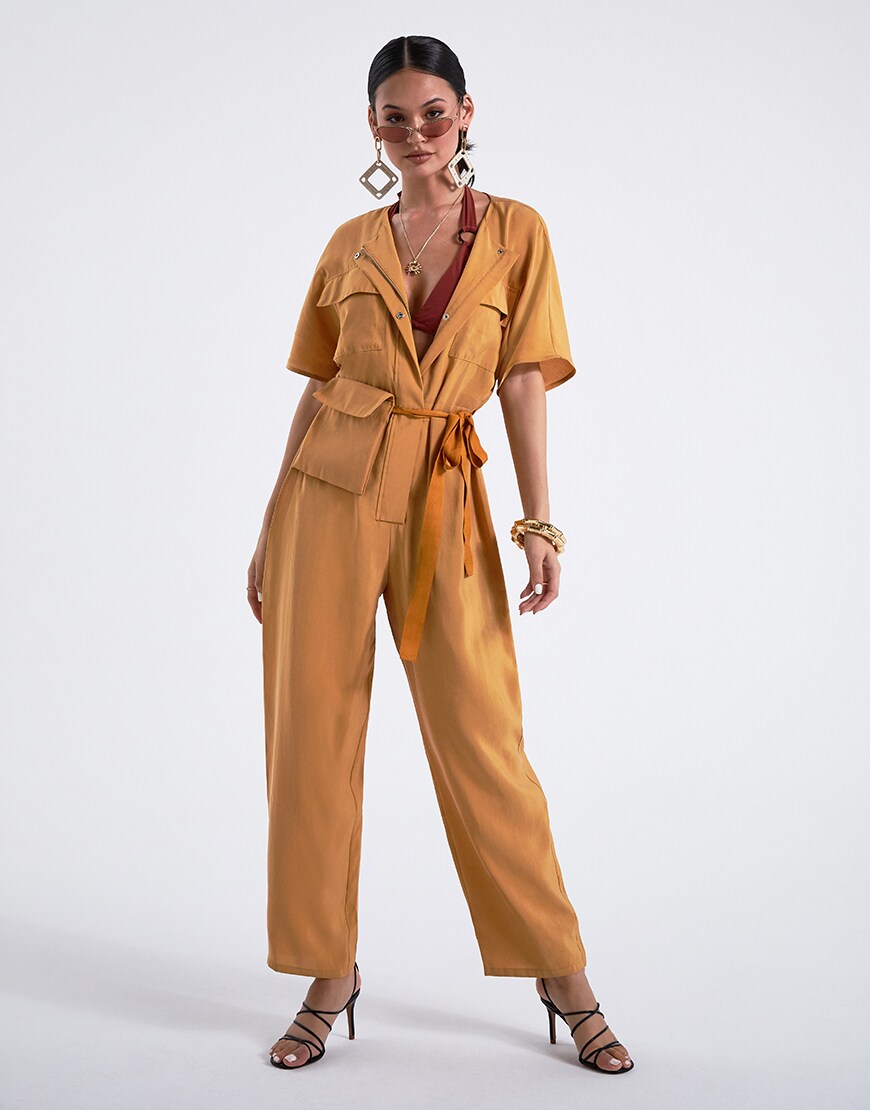 A model in a brown jumpsuit and heels | ASOS Style Feed