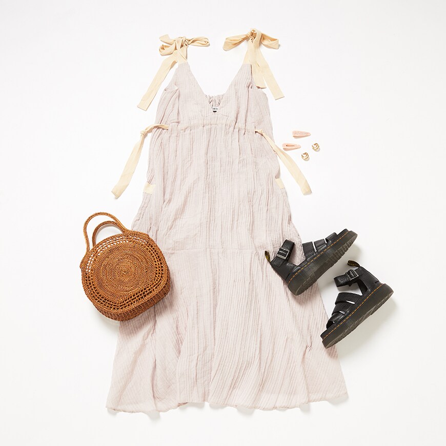 A flatlay of a dress and boots | ASOS Style Feed