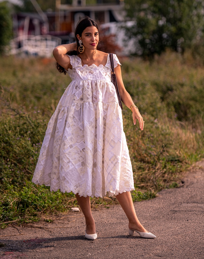 A street stylers wearing a Cecillie Bahnsen dress | ASOS Style Feed