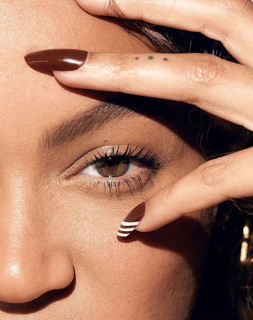 Close up of Beyonce's hand over her eye