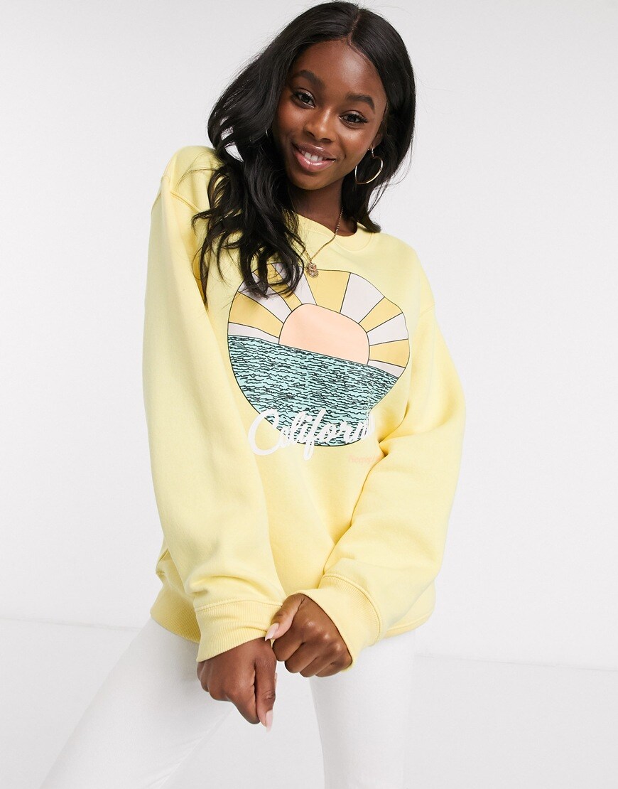 A picture of a model wearing an oversized sweatshirt by Daisy Street. Available at ASOS.