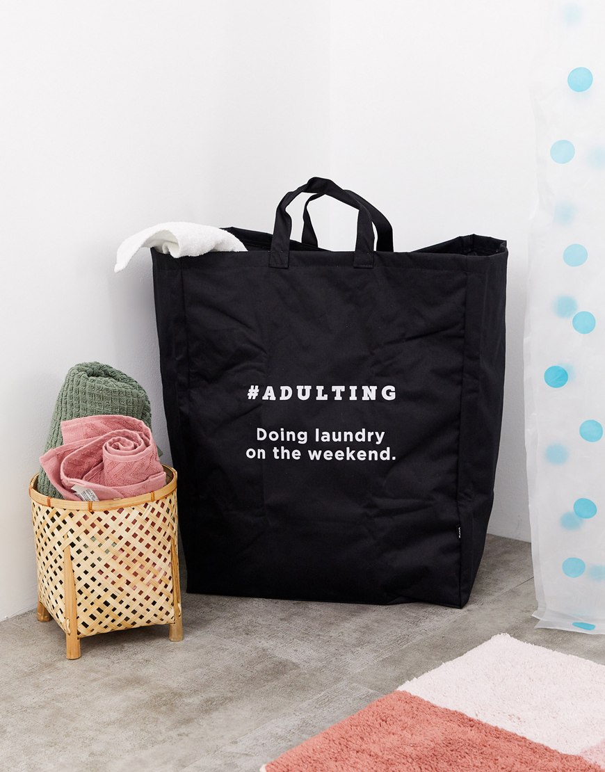 A picture of a large black laundry bag by TYPO, available at ASOS.