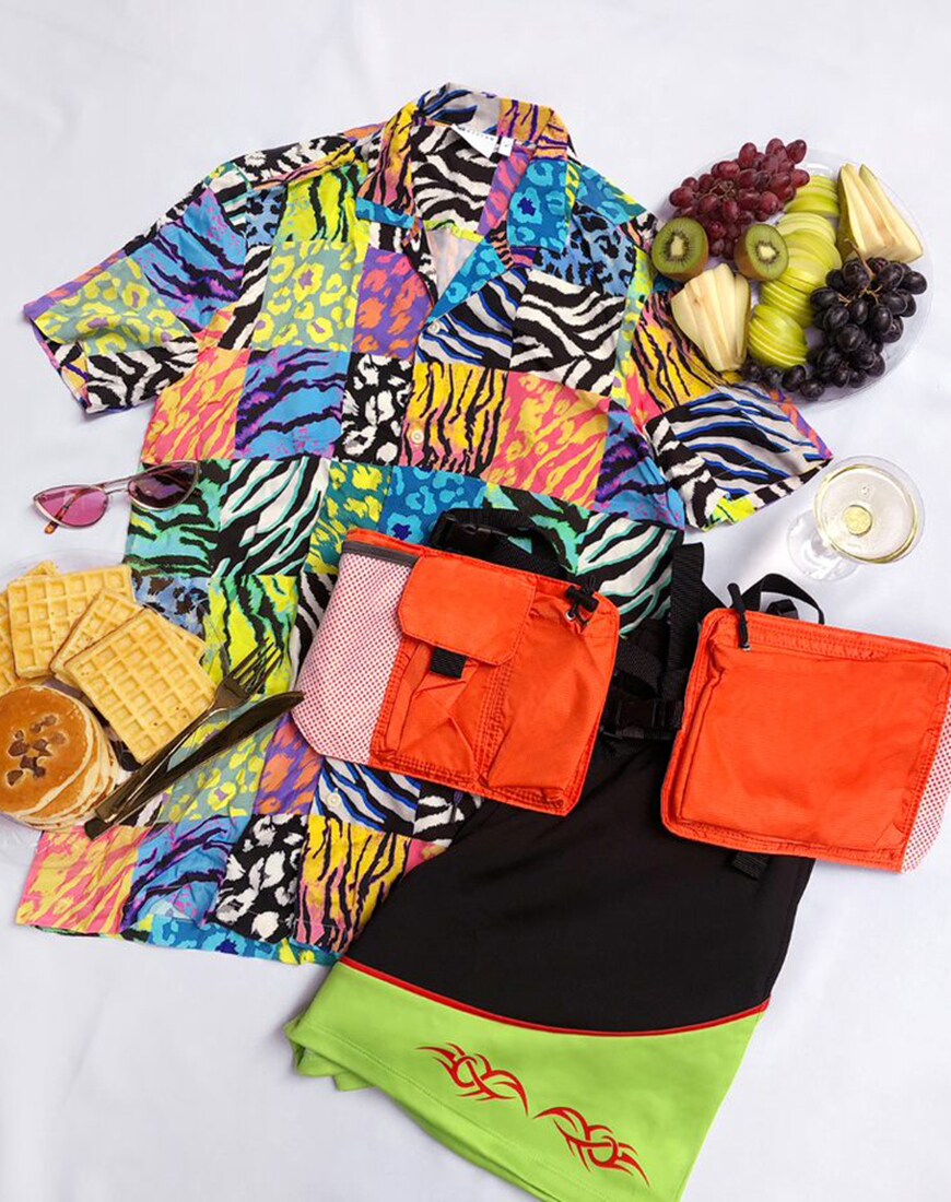 A picture of a multi-coloured, animal-print patchwork shirt, black shorts and accessories. | ASOS Style Feed