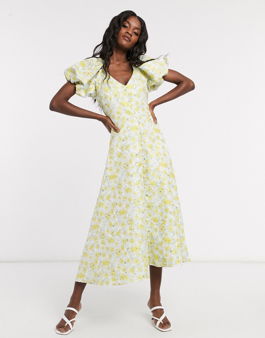 A picture of a woman wearing a yellow floral dress by Dream Sister Jane | ASOS Style Feed