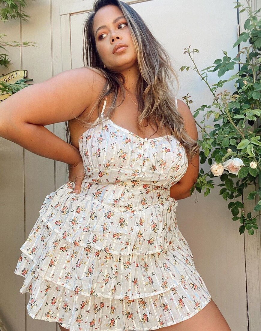 Catieli wears a floral babydoll dress from ASOS