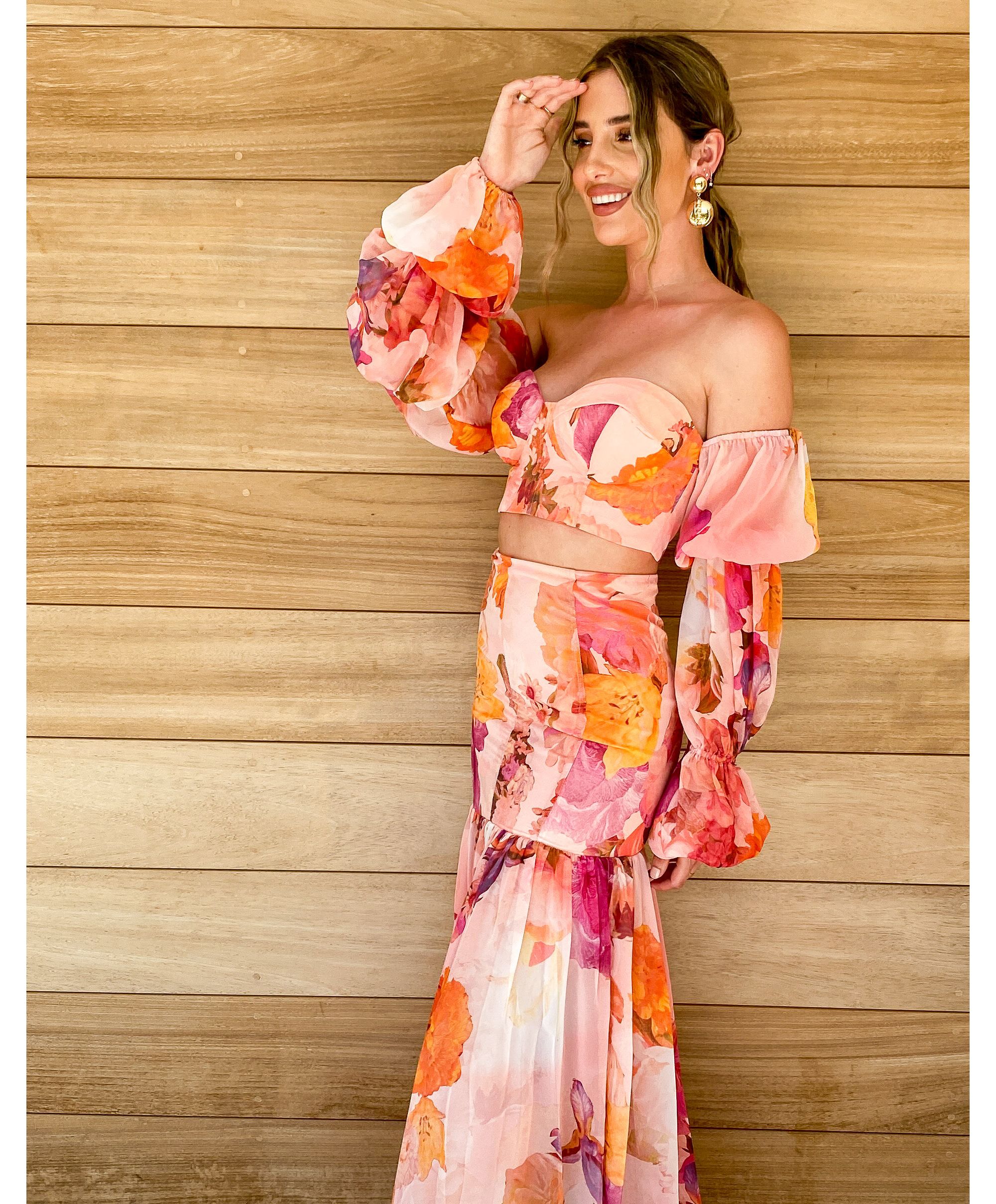 Tia Lineka wears a pink floral co-ord by ASOS DESIGN