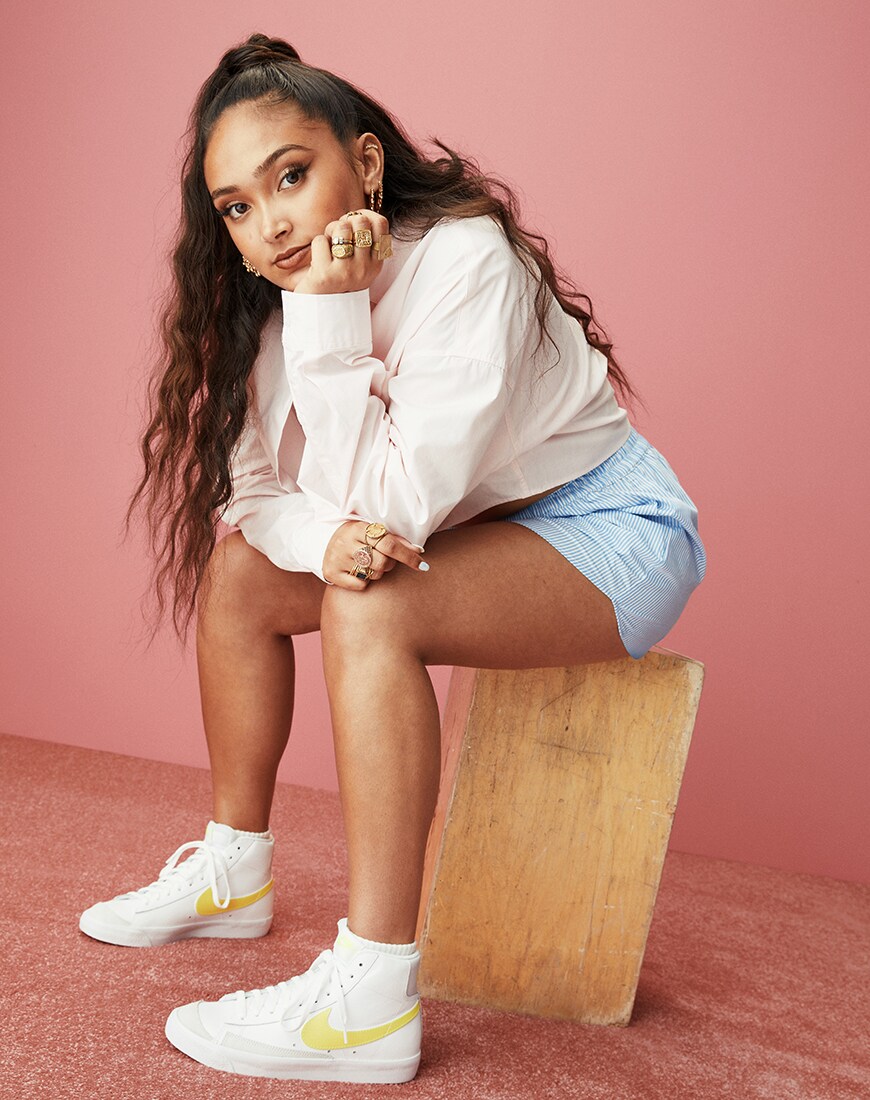 A picture of singer-songwriter Joy Crookes wearing a pair of Nike Blazer '77. Available at ASOS | ASOS Style Feed