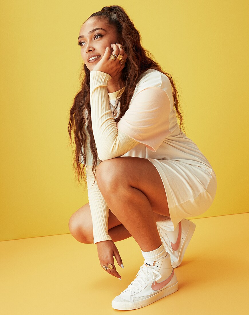 A picture of singer-songwriter Joy Crookes wearing a pair of Nike Blazer '77. Available at ASOS | ASOS Style Feed