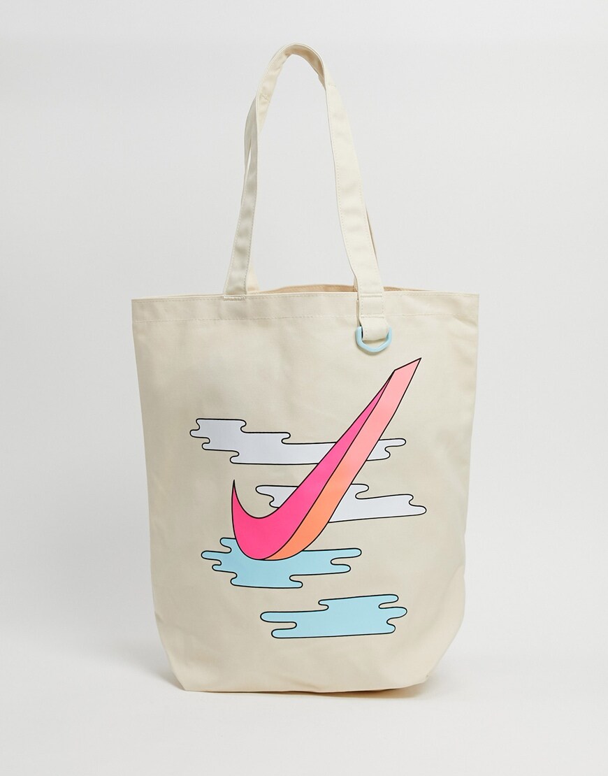An image of a beige bag by Nike | ASOS Style Feed