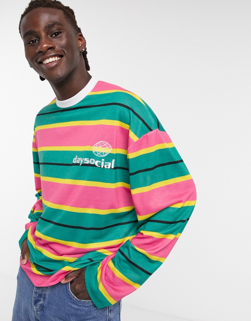 An image of a man wearing a multi coloured t-shirt by ASOS Design | ASOS Style Feed