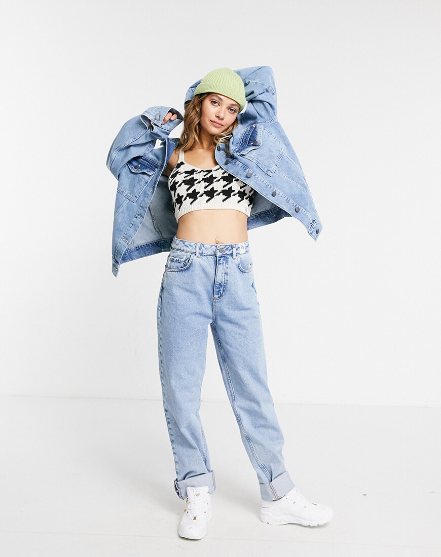 A picture of a female model wearing a recyclable blue denim jacket from the ASOS DESIGN Circular Collection | ASOS Style Feed
