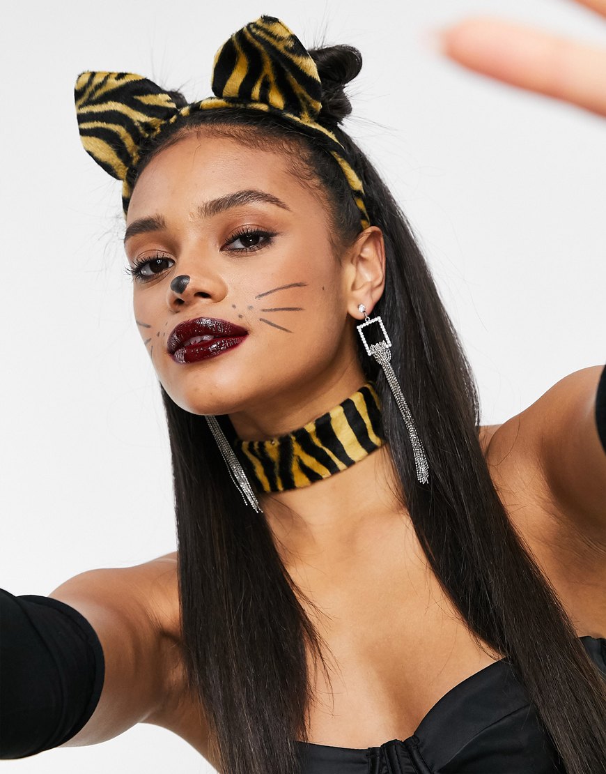 A picture of a model wearing cat ears and a choker.  Available at ASOS |ASOS Style Feed