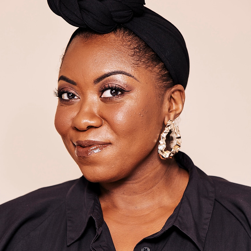 Dominique smiling in a professional shot | ASOS Style Feed