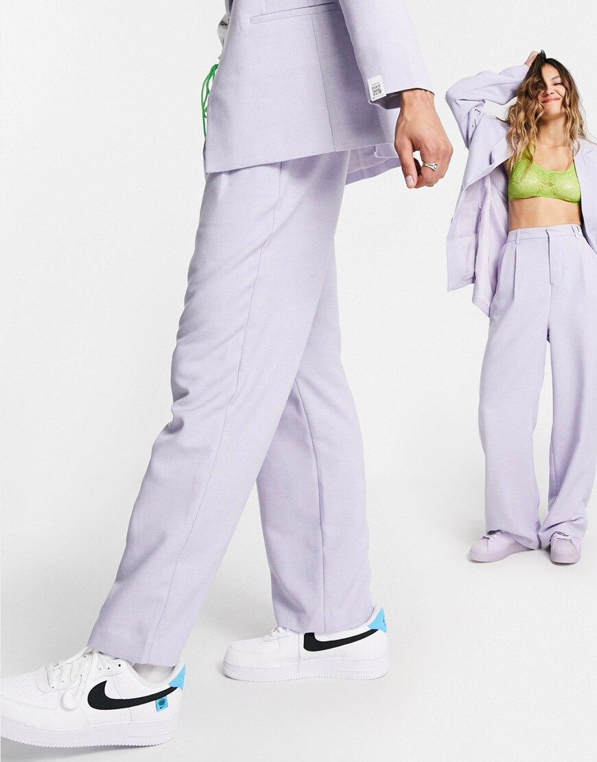 An image of a woman wearing lilac trousers by ASOS Design | ASOS Style Feed