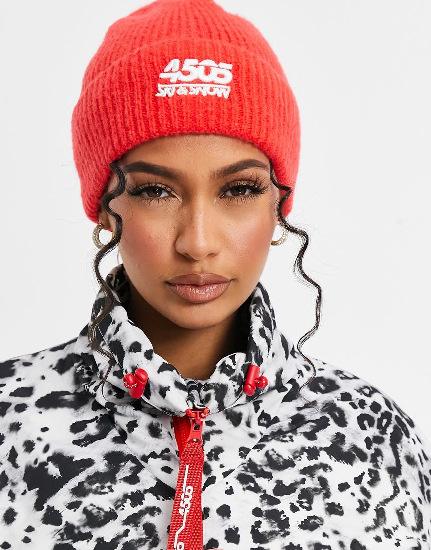 Model wearing ASOS 4505 red ski beanie hat