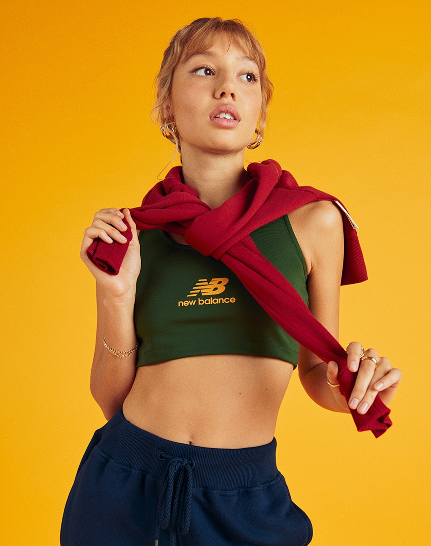 A picture of a model wearing a crop top, joggers and sweatshirt from the new and exclusive New Balance Varsity Collection. Only available at ASOS |  ASOS Style Feed