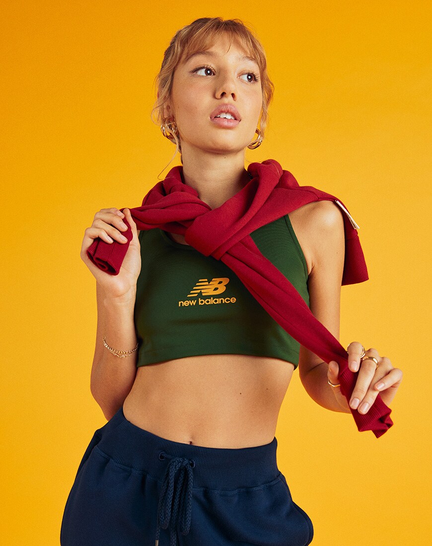 A picture of a model wearing a crop top, joggers and sweatshirt from the new and exclusive New Balance Varsity Collection. Only available at ASOS | ASOS Style Feed