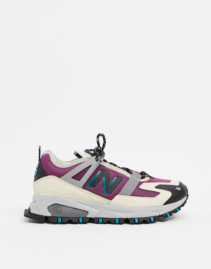 An image of a purple and white trainer by New Balance | ASOS Style Feed