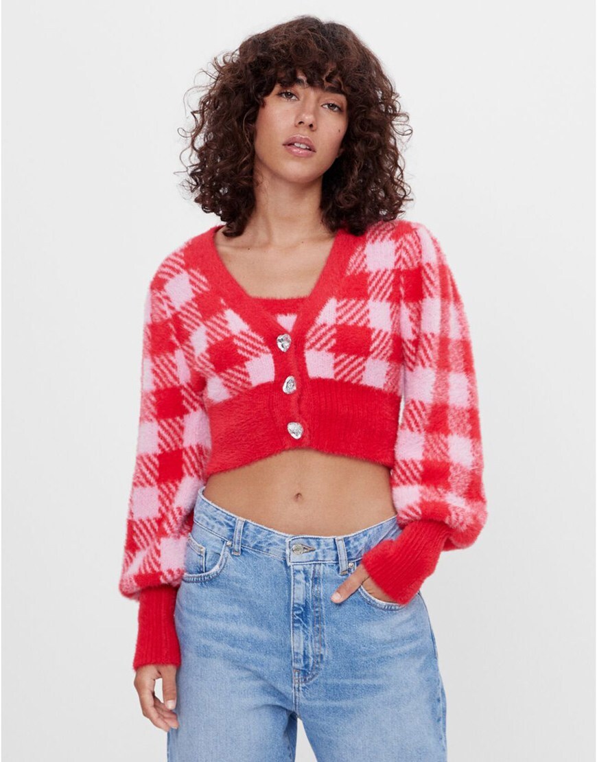 Model wearing Bershka plaid print cardigan twinset co-ord with jewel buttons in red