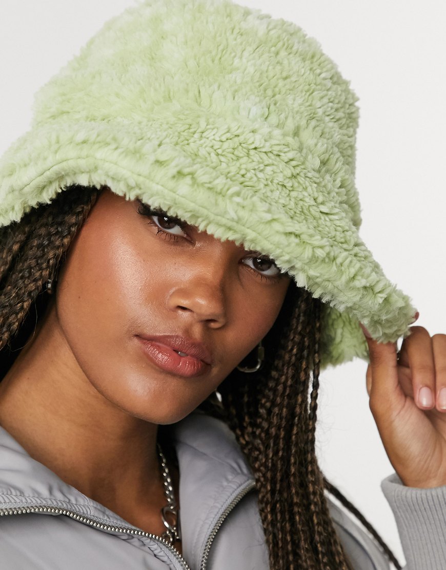 ASOS DESIGN borg roll back bucket hat in green | ASOS Style Feed