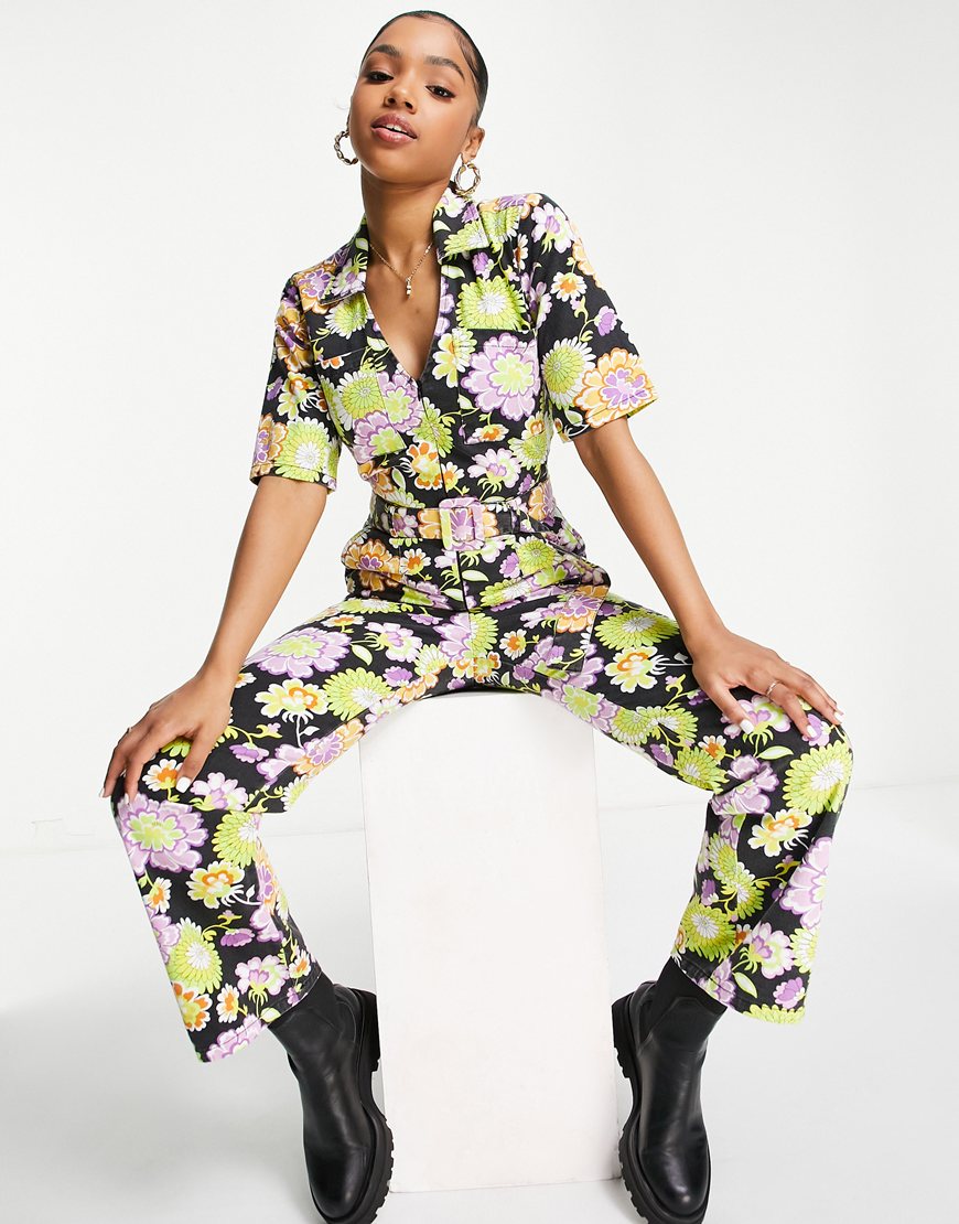 ASOS DESIGN twill short sleeve zip front buckle fit and flare jumpsuit in retro floral | ASOS Style Feed