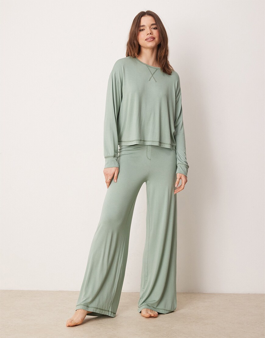 Woman wearing a light green loungewear set