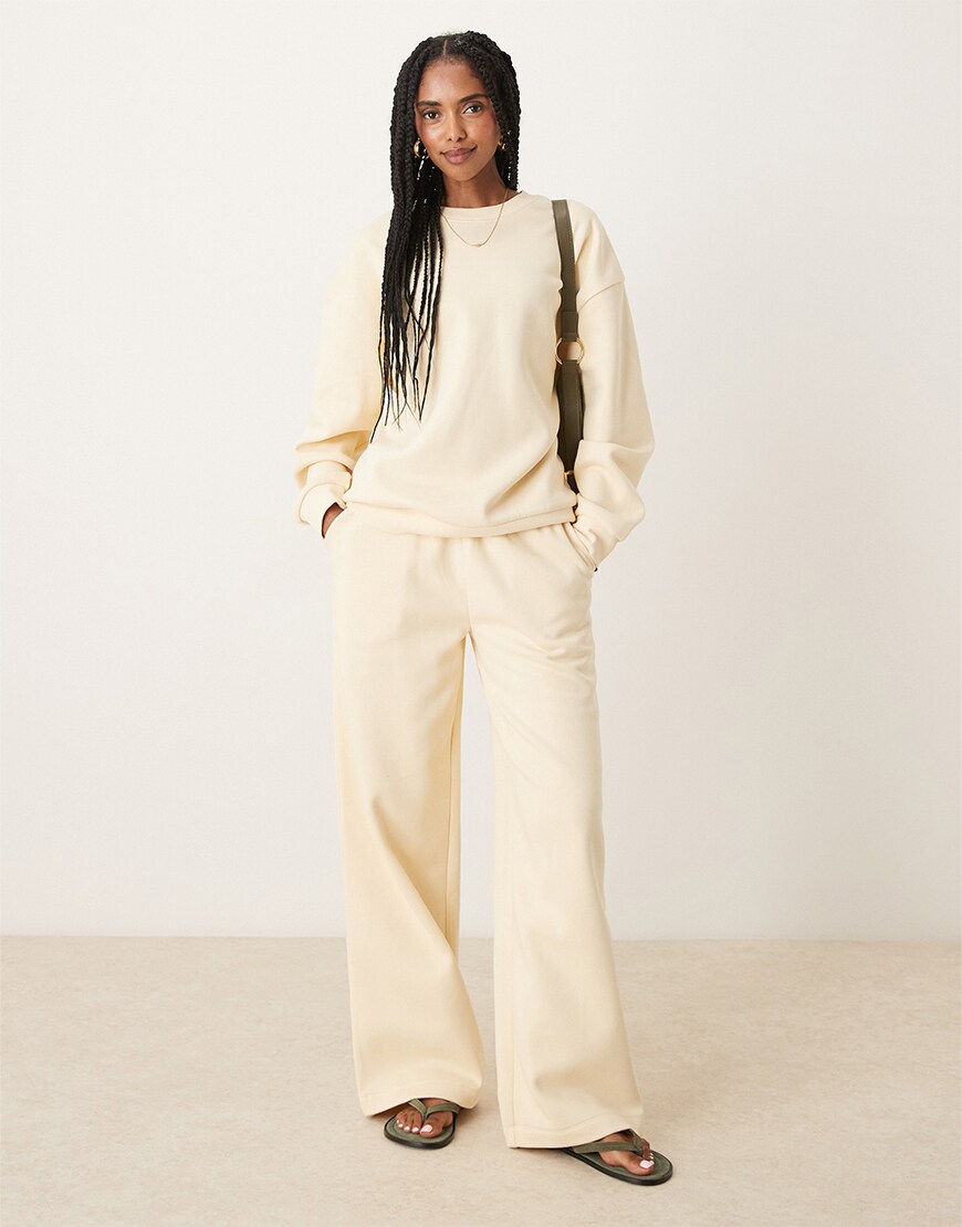 Woman wearing a light yellow loungewear set