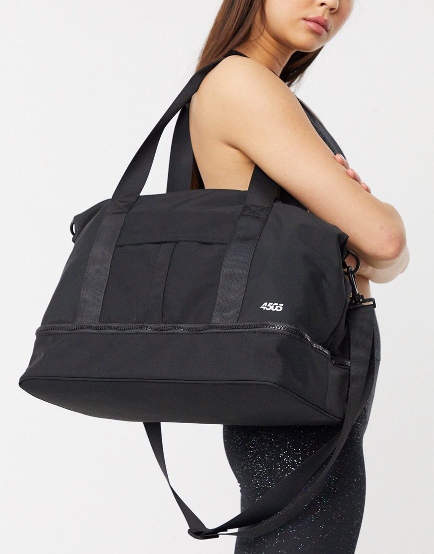 A picture of a model holding a black holdall by ASOS 4505 | ASOS Style Feed