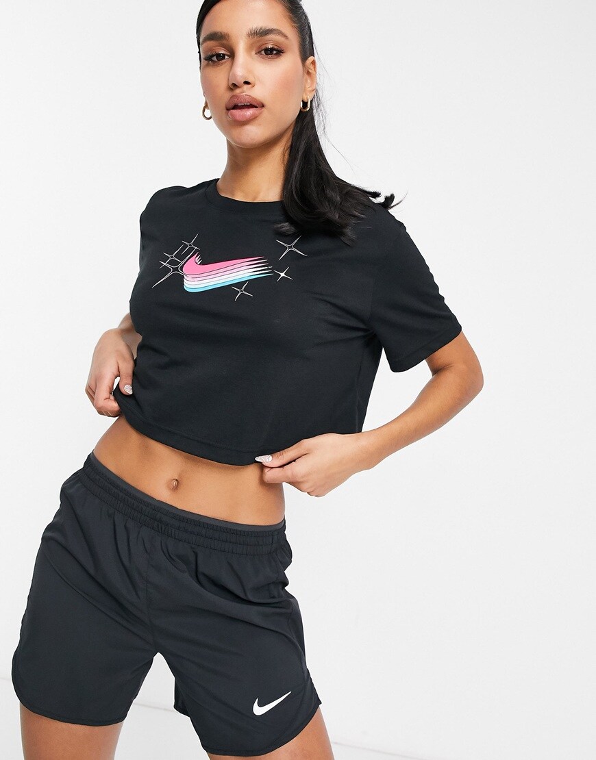 A picture of a model wearing cropped Nike training top. Available at ASOS | ASOS Style Feed