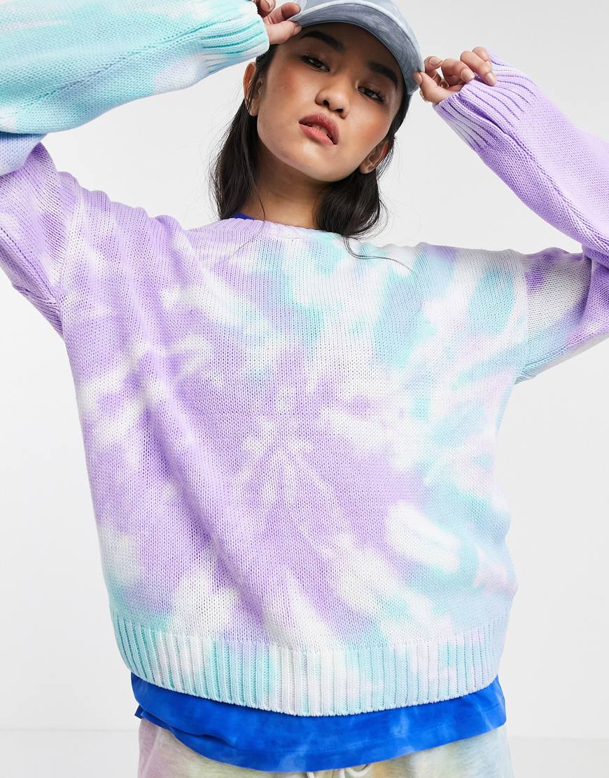 Model wearing ASOS DESIGN tie dye sweater in lilac