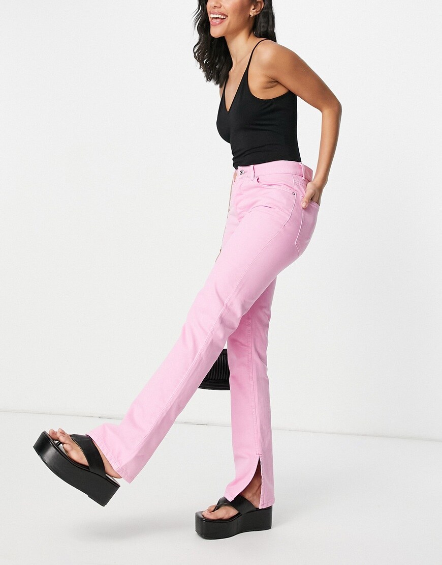 An image of a woman wearing pink jeans by ASOS Design | ASOS Style Feed
