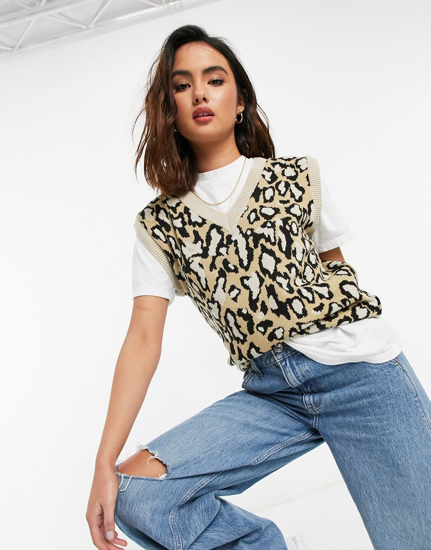 An image of a woman wearing a leopard print sweater vest | ASOS Style Feed