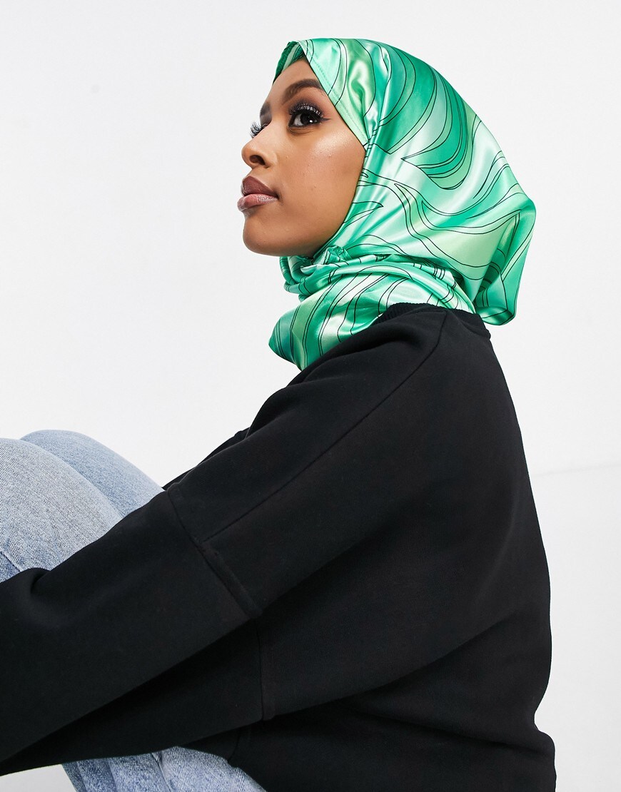 An image of a woman wearing a green headscarf by ASOS Design | ASOS Style Feed