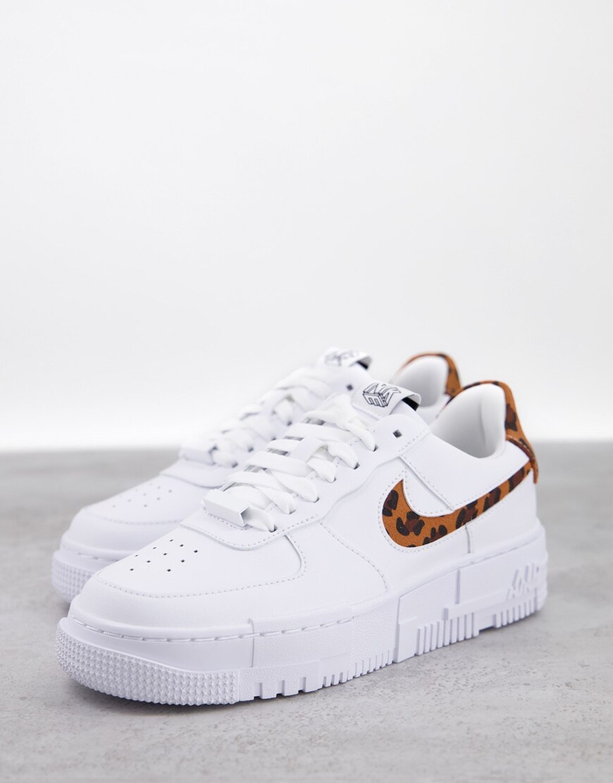 An image of a pair of white trainers by Nike  | ASOS Style Feed 