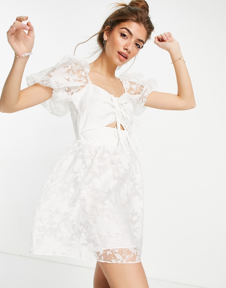 A model wearing a white dress | ASOS Style Feed
