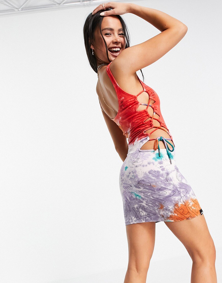 An image of a woman wearing a red tie-dye dress by Grimey | ASOS Style Feed