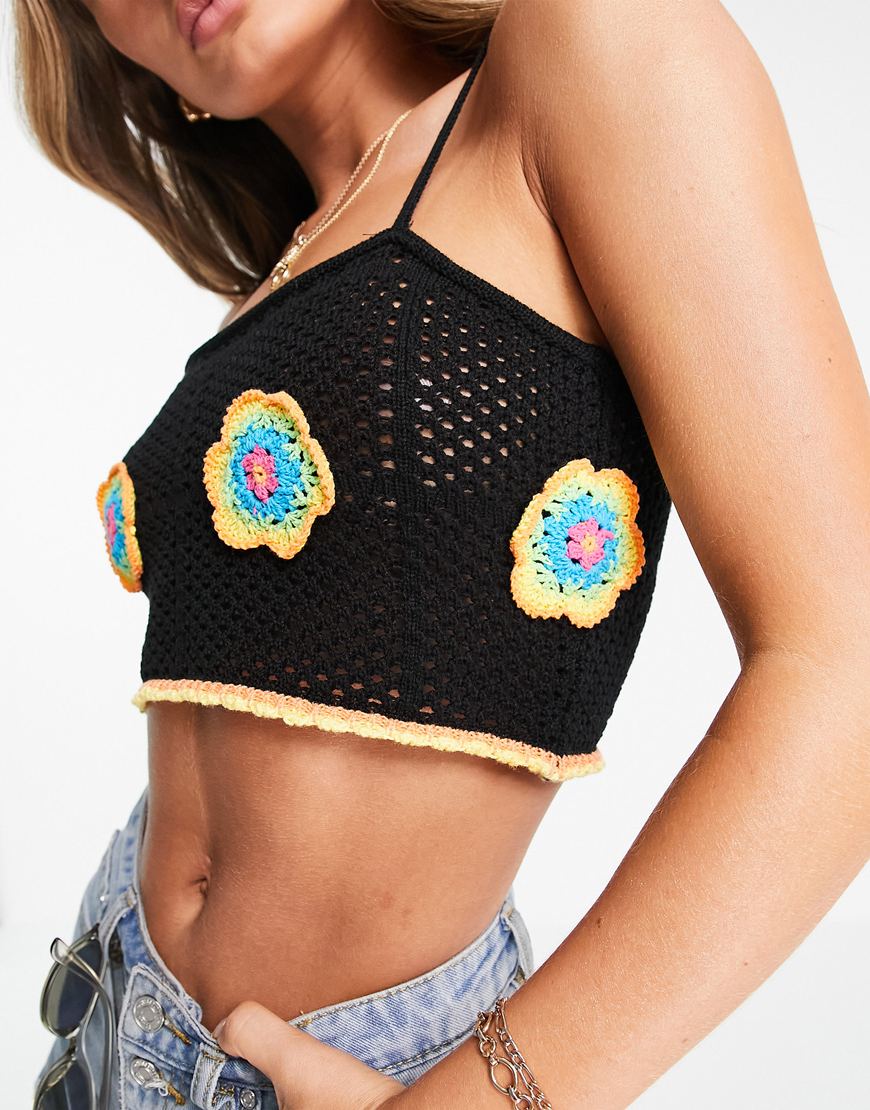 An image of a woman wearing a black crochet crop top by ASOS Design | ASOS Style Feed