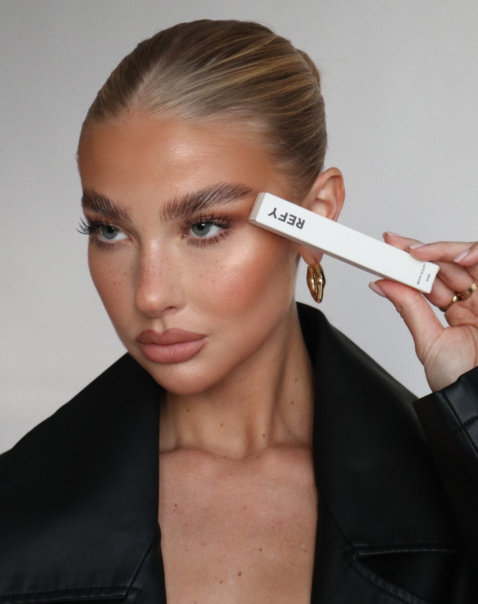 Influencer, model and CEO Jess Hunt poses with a product from her new line. | ASOS Style Feed