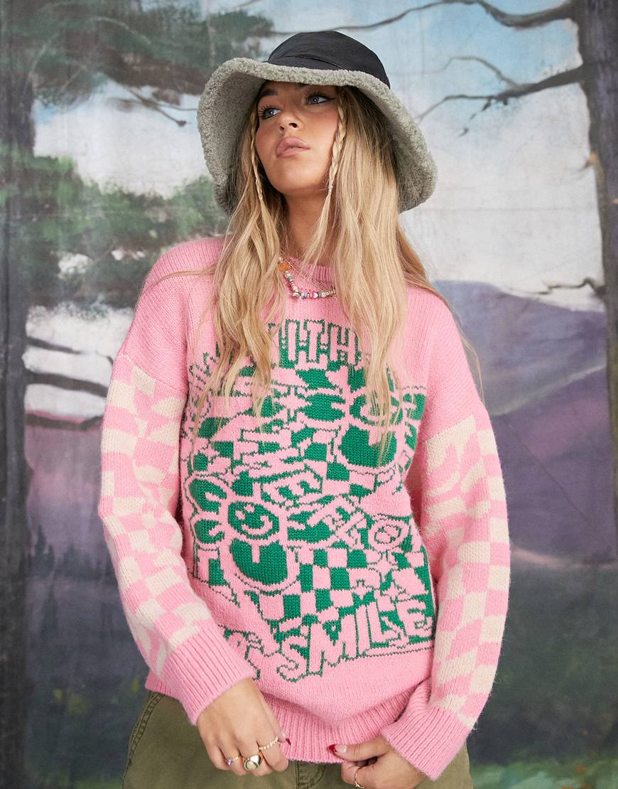 An image of a woman wearing a slogan print sweater by ASOS DESIGN | ASOS Style Feed