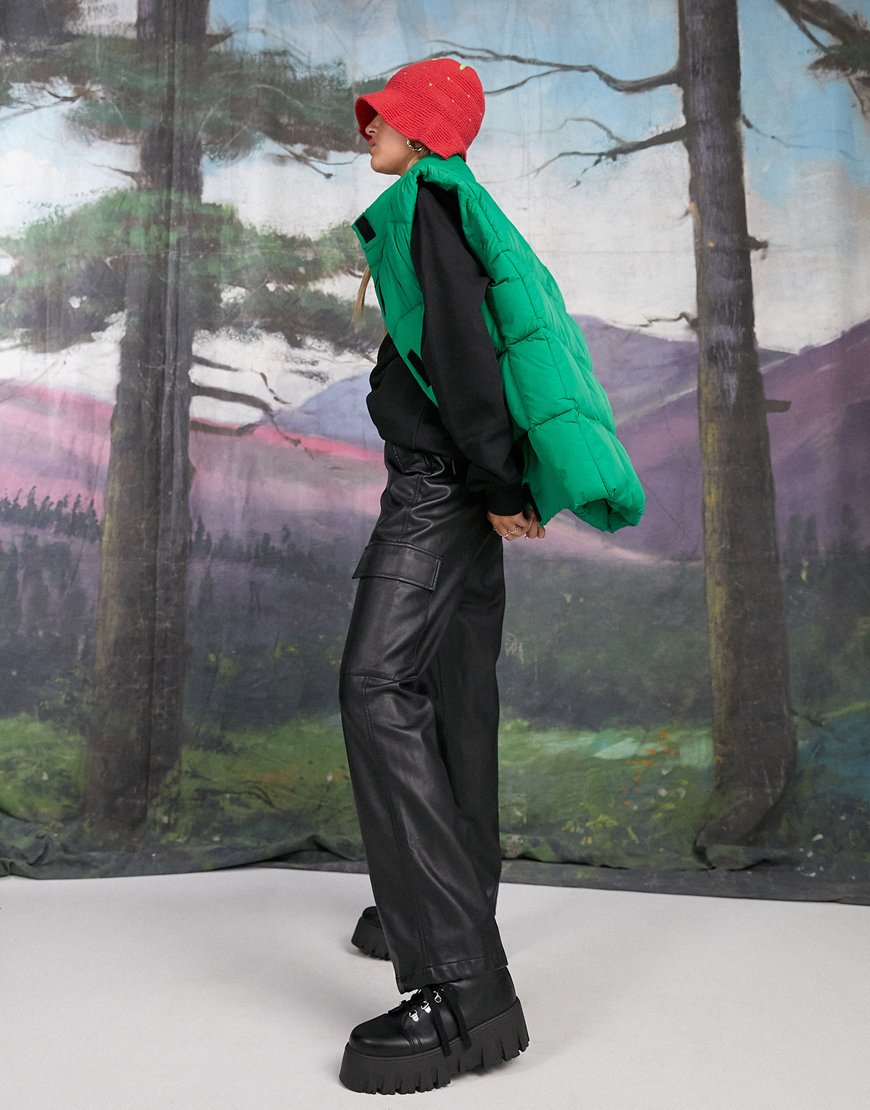 An image of a woman wearing faux-leather cargo trousers by ASOS Design | ASOS Style Feed