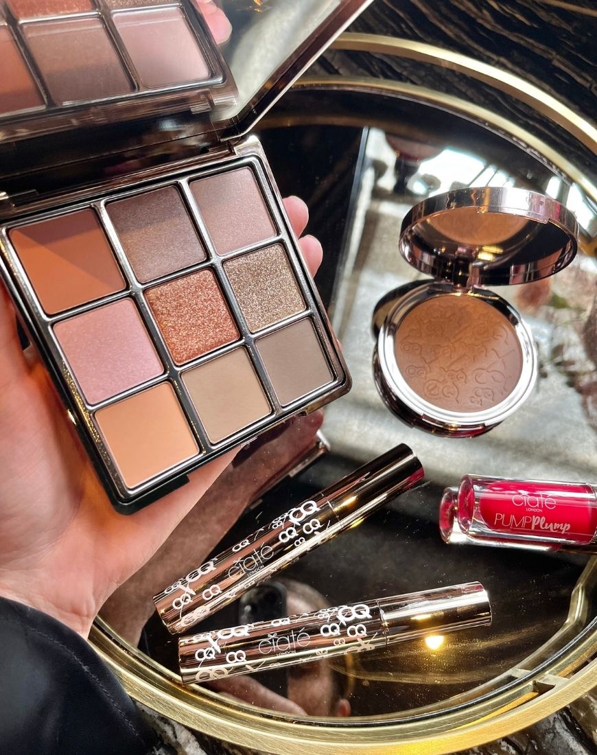 An image showing the full Christine Quinn x Ciate collection. This includes the Boss B*tch palette, the No Filt-her highlighter, the plumping lip gloss and the Drama Queen lip cream. | ASOS Style Feed