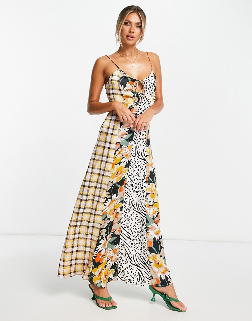Model is wearing a patchwork 70s-inspired maxi slip dress. The patterns range from animal-print to floral. ASOS Style Feed