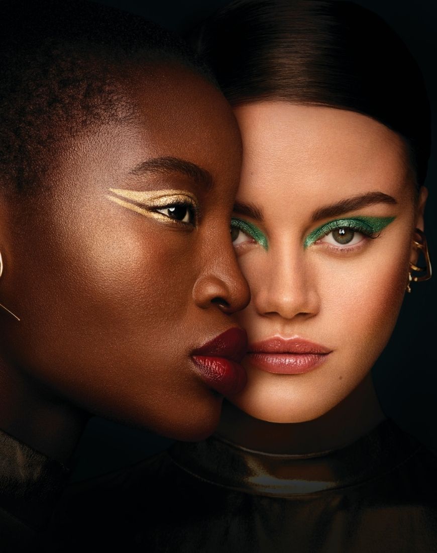 Two models are wearing different looks created using the Urban Decay x Marvel Studio's Eternals collection. One is wearing a gorgeous gold look and the other a green cat eye. | ASOS Style Feed